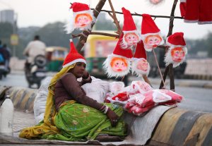 Santa Claus masks sold on roadside in Ahmedabad